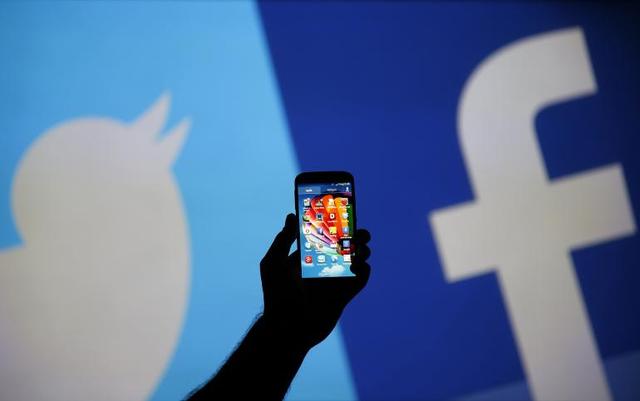 Facebook and Twitter face a 'bully tax' in Britain